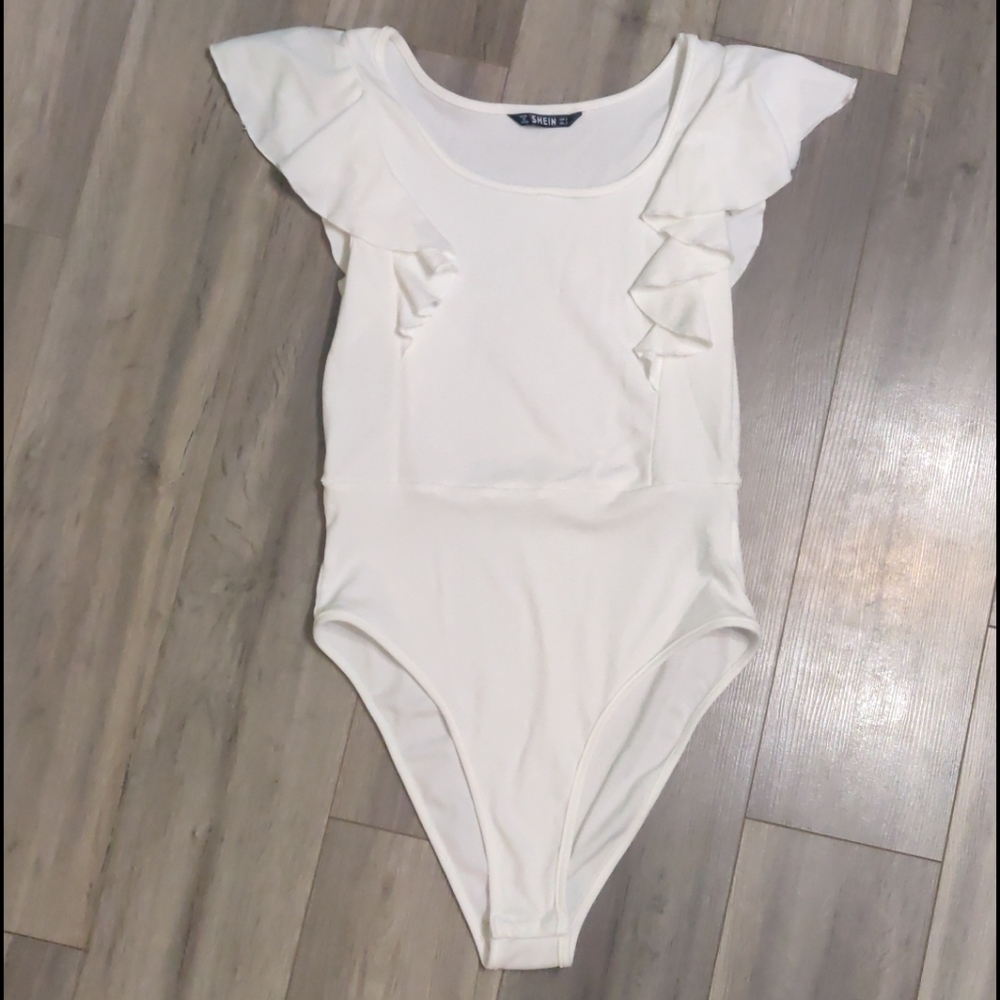 *FREE WITH PURCHASE* Ruffled cheeky-cut bodysuit